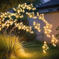 JJGoo Solar Garden Lights, New Upgraded 4 Pack Solar Swaying Starburst Light, Waterproof Fireworks Outdoor Lights, Yard Patio Pathway Decoration, Warm White
