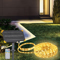 DBFAIRY 50Ft Solar LED Strip Lights Outdoor, Large Capacity Solar Powered Light Strip Auto On/Off with Remote Timer 8 Lighting Modes for Pathway Patio Pool Camping Decor, 2700K Warm White