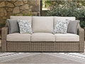 Signature Design by Ashley Carmel Bay Casual Outdoor Sofa with Cushion, Weather Resistance and Armrest, Beige & Dark Brown